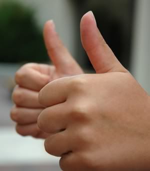 two thumbs up Pictures, Images and Photos