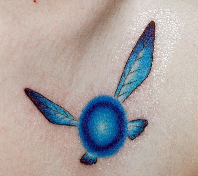 I got Navi (Ocarina of Time) tattooed just below my collarbone yesterday and