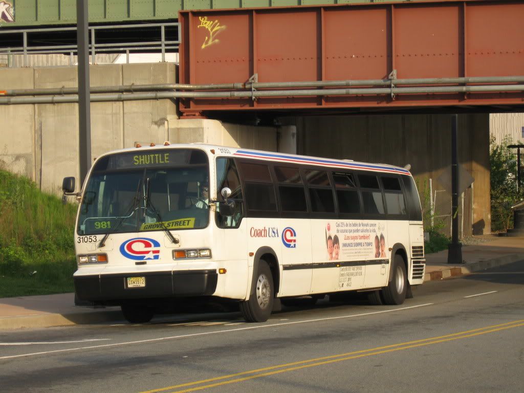 1999 Coach USA Nova Bus RTS RT8O2N 31053 Wilson Street And HudsonBergen Light Rail On New Jersey