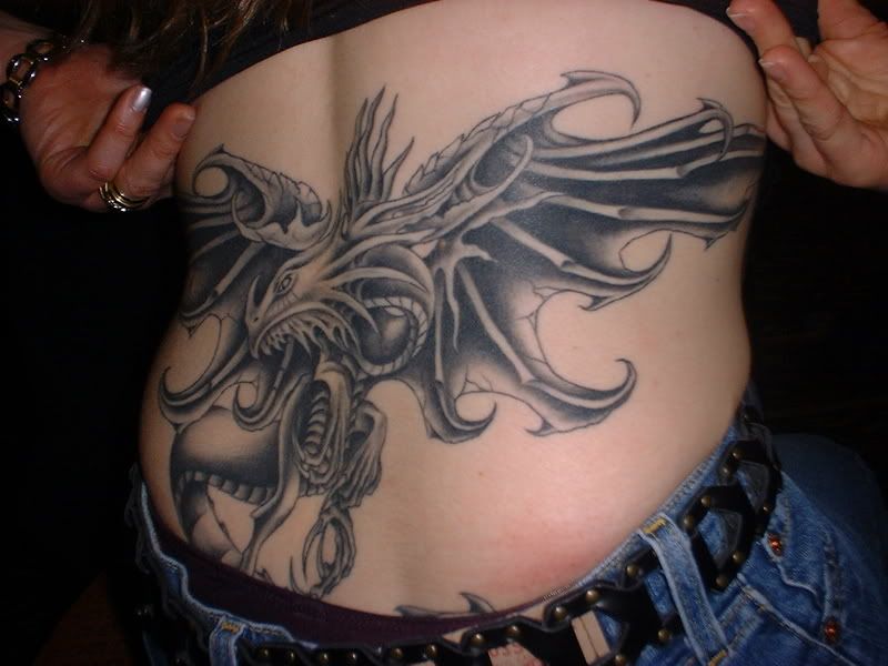 Black dragon tribal tattoos designs pictures 4