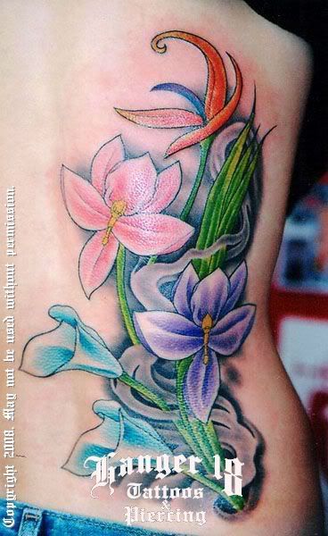 pictures of flower tattoos. flower tattoo designs,