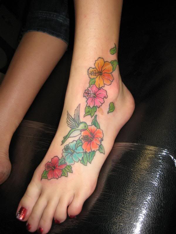 Nice flower foot tattoo for girl