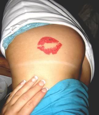 Sexy kiss tattoo
