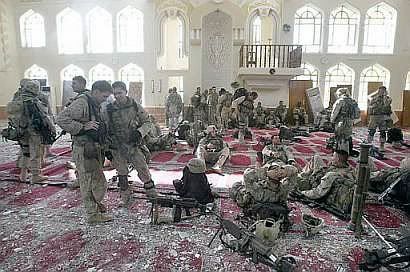 US soldiers showing respect in a mosque in Falluja.