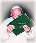 Pope kissing at the Qur'an at the Umayyad Mosque, Damascus.