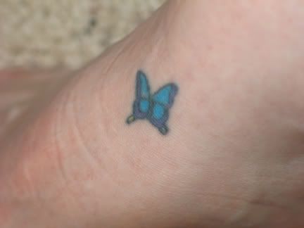 small butterfly tattoos. Small Butterfly Tattoo