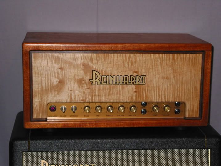 My first high profile client is one Bob Reinhardt of Reinhardt Amplification. He asked for something with woods like an old Les Paul. Here is the result.