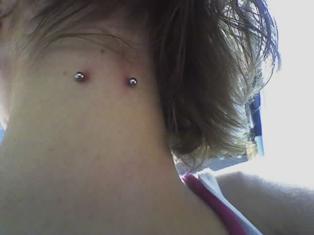 this is my surface piercing that i had done last week. i saw my piercer and 