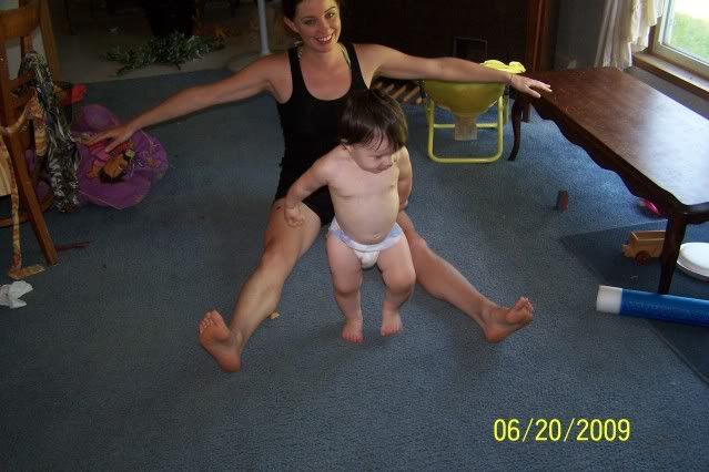 shauna doing pilates...Aubrey Jo likes to help