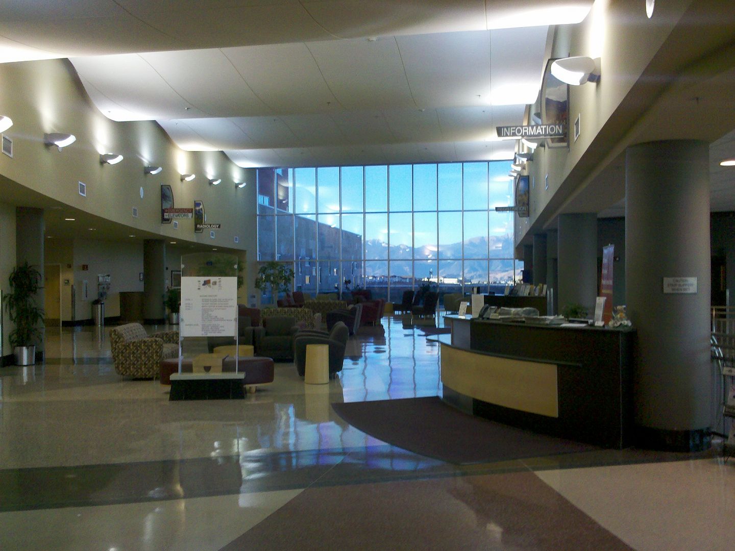 main entrance to the hospital, window full of Pike's Peak