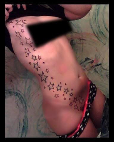 tattoo on girls ribs. Re: Tattooed girls.