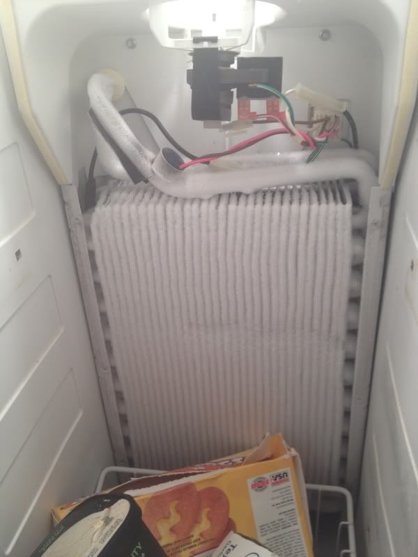 Kenmore Coldspot 106.58782890 drip pan overflowing