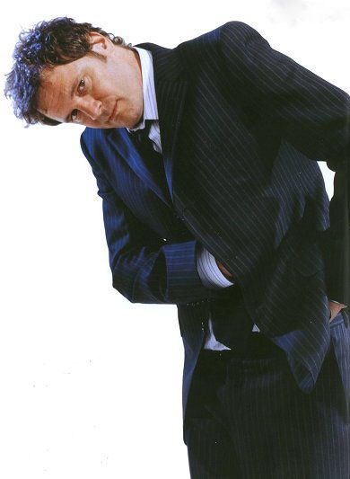 http://img.photobucket.com/albums/v630/ladylight518/Colin%20Firth%20Pictures/bluesuit.jpg