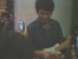 blurred photo of Gosh..lol i got his autograph..astig sya..