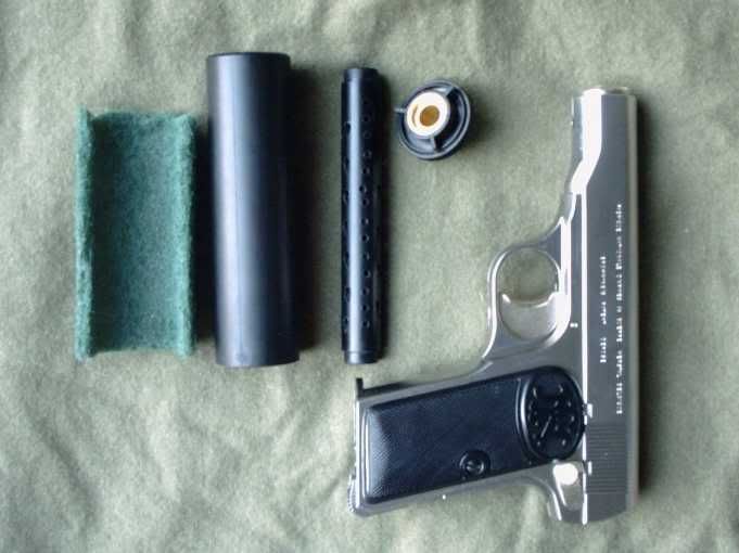 Teflon scrubber cut to size, Silencer shell, drilled out inner barrel, muzzle-attachment, and the M1910