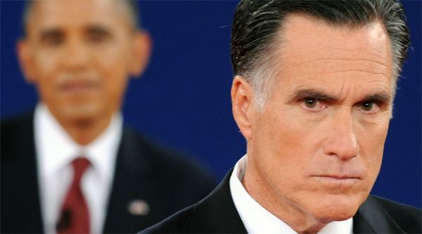 Romney scowls mightily in the foreground, while President Obama grins all chillaxed in the background