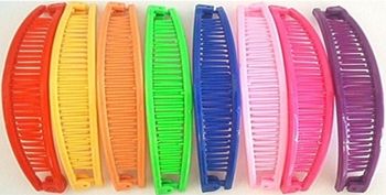 image of a bunch of colorful banana clips for the hair