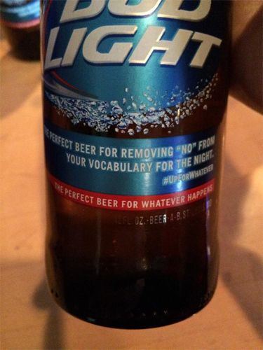 image of a bottle of Bud Light, the label on which reads: 'The perfect beer for removing 'no' from your vocabulary for the night. #UpForWhatever. The perfect beer for whatever happens.'