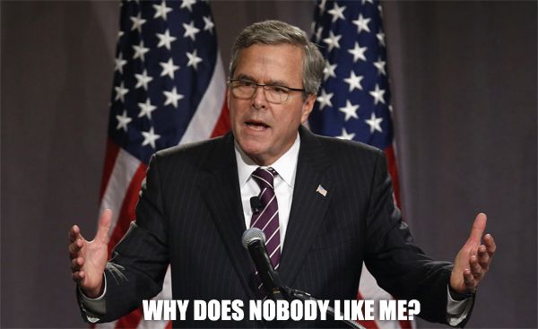 image of Jeb Bush standing at a podium in front of US flags, his arms spread wide, to which I've added text reading: 'Why does nobody like me?'