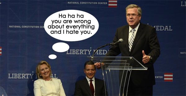 image of Hillary Clinton smiling tersely sitting on stage behind Jeb Bush as he speaks, to which I've added a thought bubble indicating Hillary is thinking: 'Ha ha ha you are wrong about everything and I hate you.'