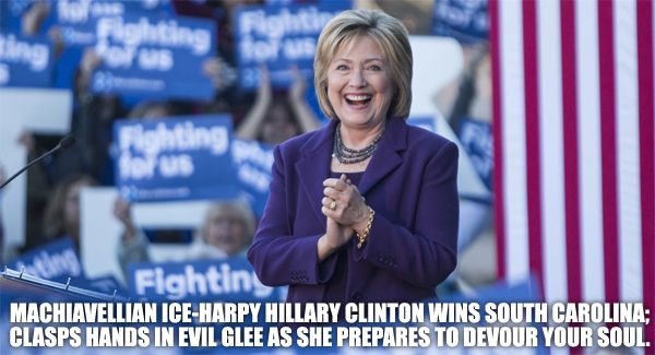 image of Hillary Clinton standing and smiling with her hands clasped together, against a backdrop of a US flag and supporters holding 'Fighting for us' signs, to which I've added text reading: 'Machiavellian ice-harpy Hillary Clinton wins South Carolina; clasps hands in evil glee as she prepares to devour your soul.'