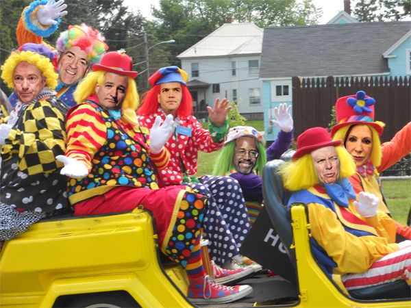 image of a clown car filled with seven clowns, whose faces I have replaced with GOP candidates