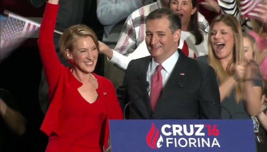 image of Ted Cruz and Carly Fiorina onstage together, smiling and waving