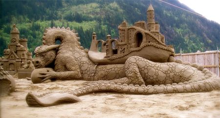 image of a dragon sculpted out of sand