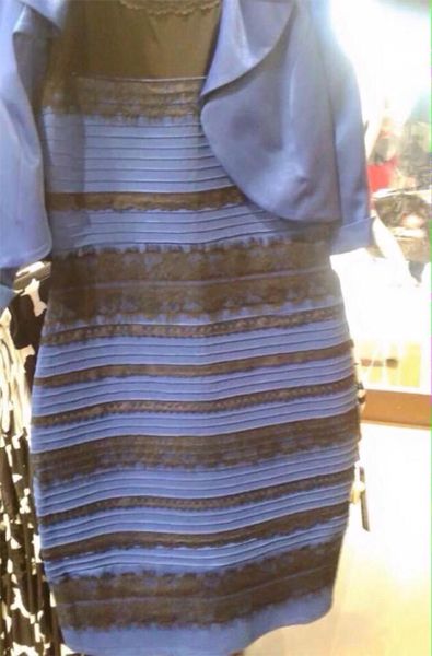 image of a striped dress hanging on a rack