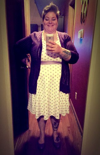 image of me in a full-length mirror wearing a white dress with purple polka dots, a purple cardigan, and purple flats