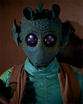 image of the character Greedo from the Star Wars universe