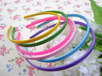 image of a bunch of colorful plastic headbands