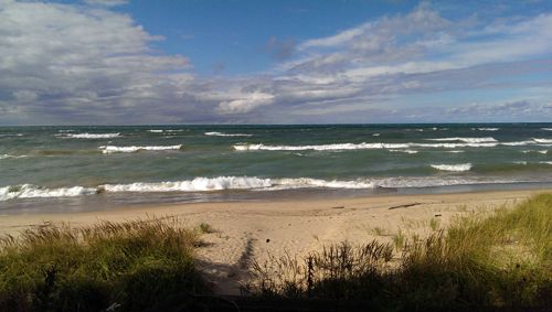 image of the dunes along Lake Michigan on a breezy, sunny day