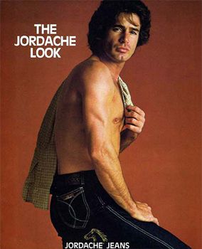 image of an advertisement for Jordache Jeans, featuring a shirtless man wearing tight Jordache Jeans and giving a smoldering look, with text reading THE JORDACHE LOOK