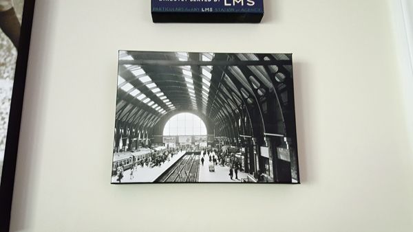 image of a black and white photograph of Kings Cross station hanging on my living room wall