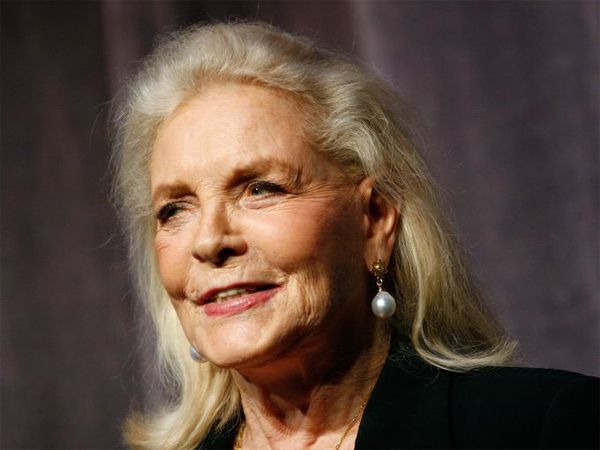 image of actress Lauren Bacall at age 82, with flowing white hair and a glint in her eye
