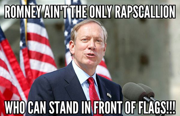 image of George Pataki speaking at a microphone in front of US flags, to which I've added text reading: 'Romney ain't the only rapscallion who can stand in front of flags!!!'