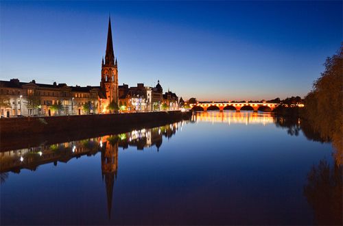 image of the Perth skyline at dusk, along the River Tay