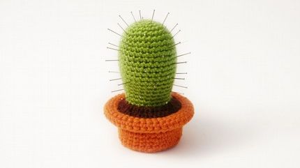 image of a knit cactus pin cushion