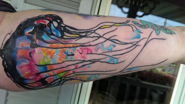 image of my left forearm, showing a jellyfish of many colors