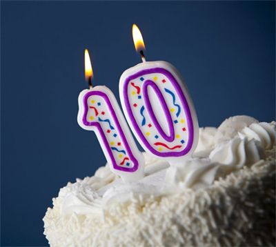 image of candles reading '10' on top of a cake