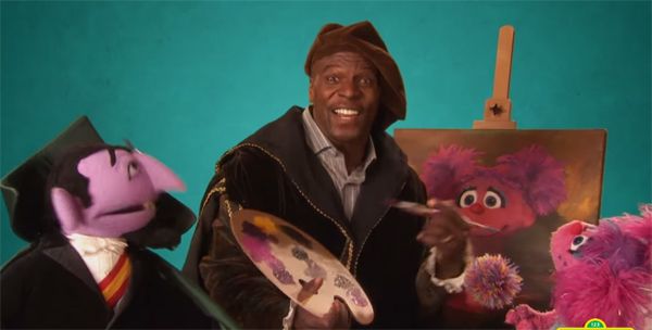 image of actor Terry Crews, a middle-aged black man, playing an artist in a Sesame Street video
