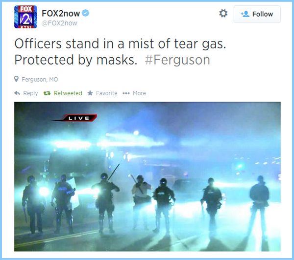 screen cap of a tweet from a local Fox affiliate featuring an image of police in riot gear in a cloud of teargas