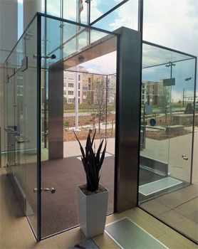 image of a glass vestibule in a corporate building