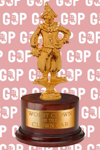 image of a gold clown trophy labeled Worst Clown in the Clown Car, sitting in front of GOP logo wallpaper