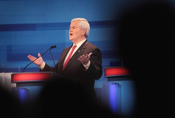 image of Newt Gingrich with his mouth open and arms outstretched