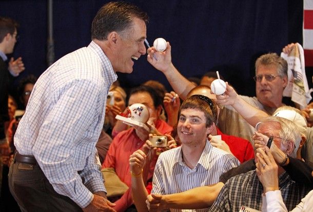 Republican presidential candidate and former Massachusetts Governor Mitt Romney shares a laugh as he greets supporters during a campaign rally in West Palm Beach, Florida, January 12, 2012. [Reuters Pictures]