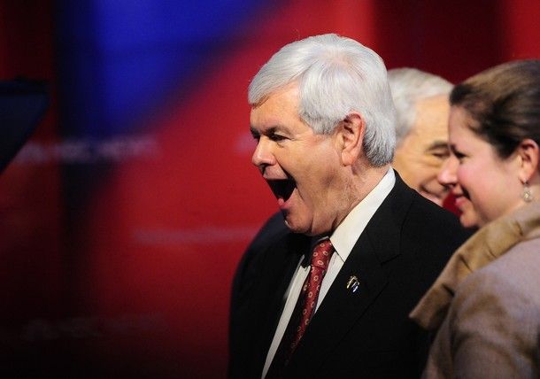 Republican presidential hopeful Newt Gingrich yawns as he leaves the stage after taking part in The Republican Presidential Debate at University of South Florida in Tampa, Florida, January 23, 2012. Florida will hold its Republican primary on January 31, 2012. [Getty Images]
