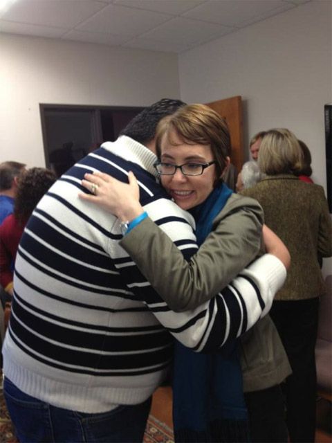 image of Daniel Hernandez and Gabrielle Giffords hugging one another