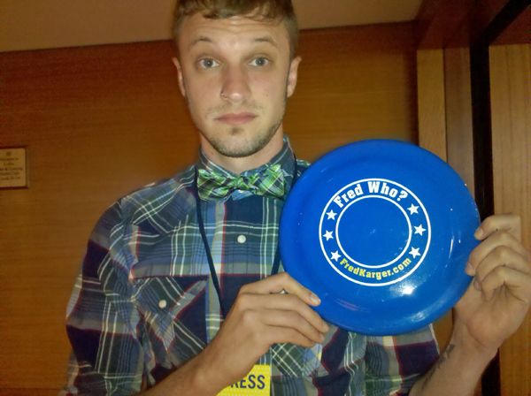 BrianWS holding up a Fred Karger-branded Frisbee